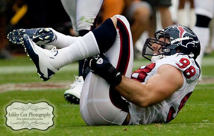 Houston Texans defensive end Connor Barwin wriths on the ground in pain after dislocating his right ankle in the first quarter of a football game against the Indianapolis Colts on Sunday afternoon September 12, 2010 at Reliant Stadium in Houston. The Texans defeated the Colts 34-24 in the season opener.