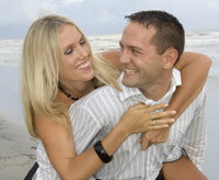 Engagement portraits on Pirates Beach in Galveston, Texas.