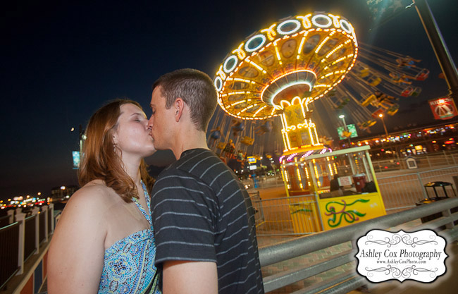 Hannah and Tim's engagement portraits on the Pleasure Pier in Galveston.
