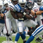 The Houston Texans defense hammers Devin Moore on a kickoff return in the first quarter of a football game against the Indianapolis Colts on Sunday afternoon September 12, 2010 at Reliant Stadium in Houston. The Texans defeated the Colts 34-24 in the season opener.